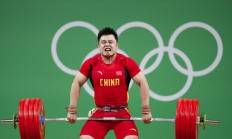 虎扑体育下载:男子举重全锦赛收官 全运会“四冠王”杨哲夺两金